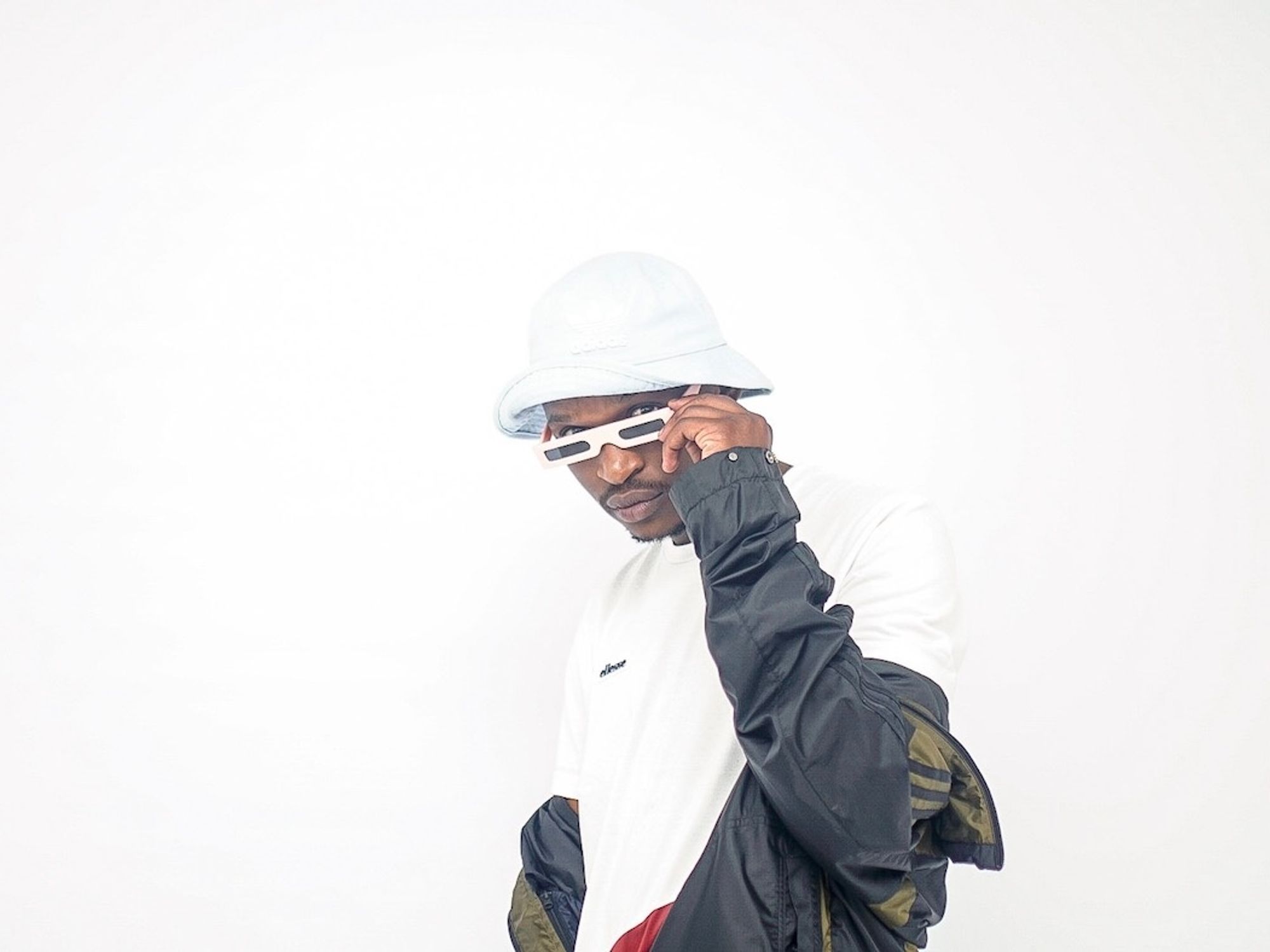 808x poses in front of a white backdrop. 