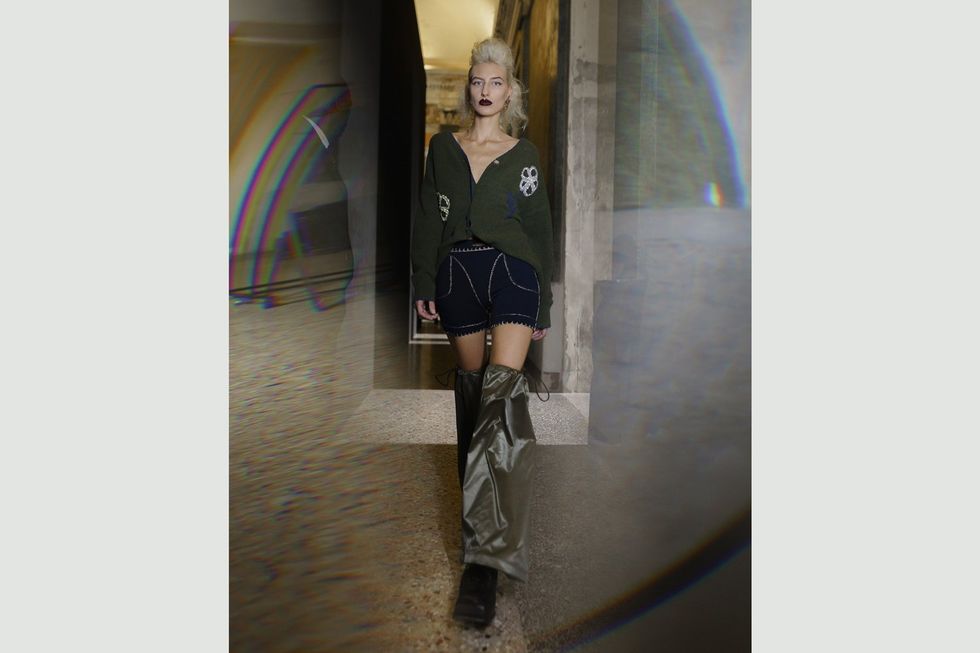 A model wearing a Maxivive Dry/Wet 24 look from the Ms Dohery collection during Milan Fashion Week.