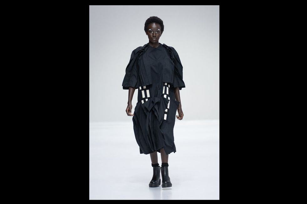 A model wearing Black Coffee on the SAFW AW24 runway.