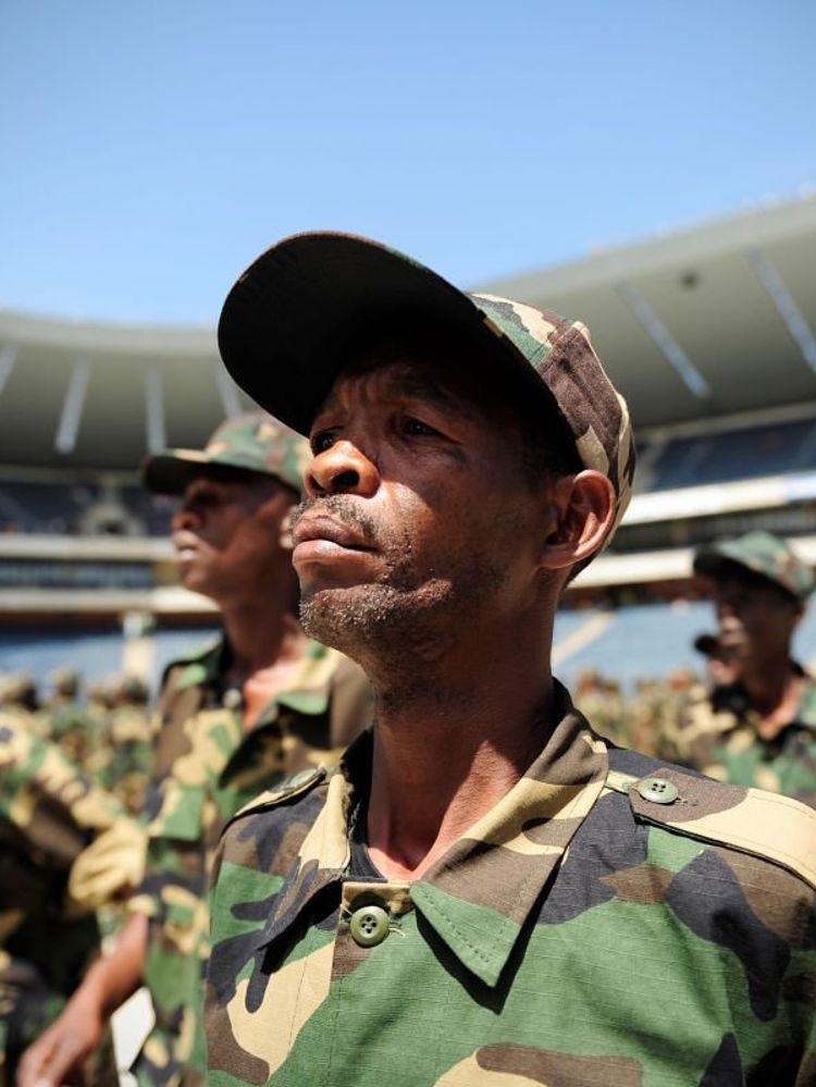 A photo of a former uMkhonto weSizwe member wearing full military camouflage during a parade marking the 50th anniversary of the group’s establishment.