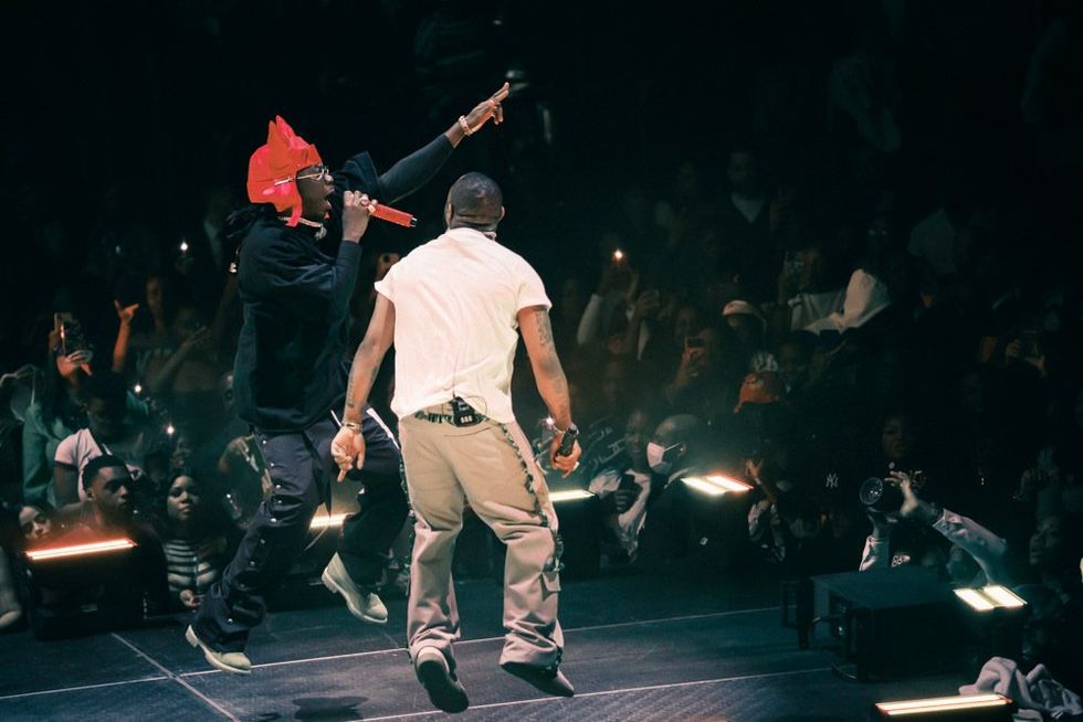 A photo of Ghanaian dancehall star Stonebwoy and Davido on stage at the latter\u2019s Madison Square Garden show.