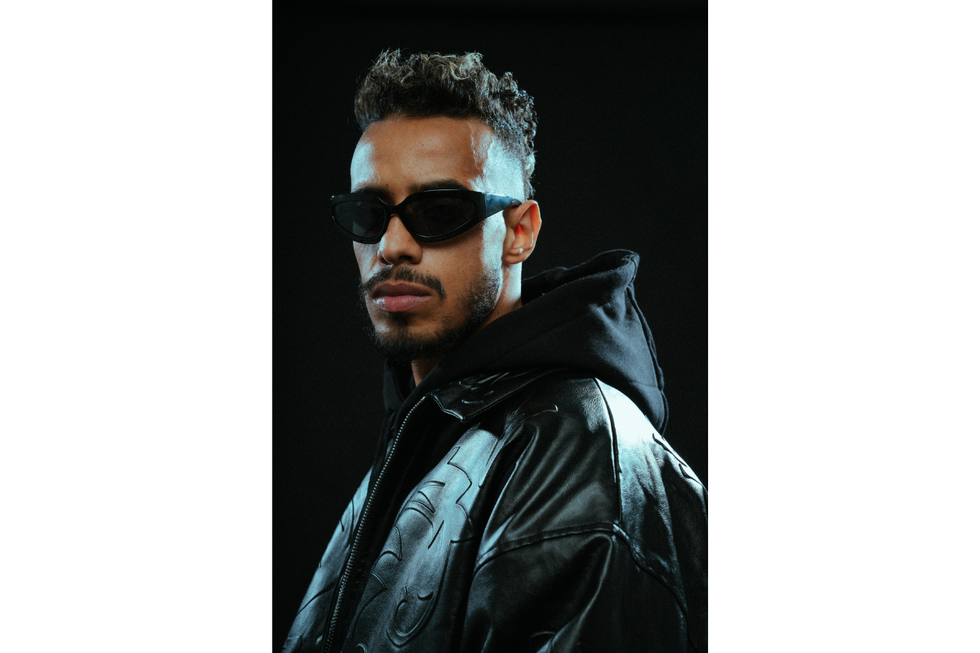 A photo of Moroccan rapper Stormy wearing a leather jacket.
