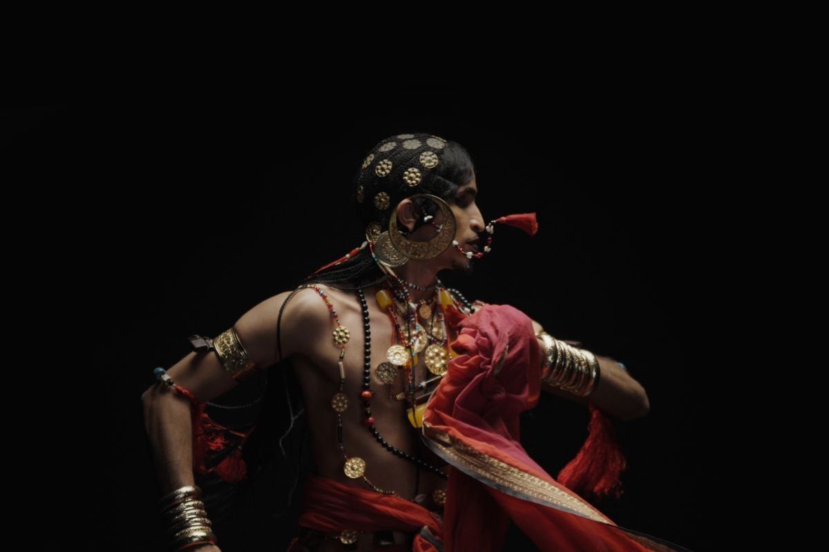 A photo of multimedia artist Ahmed Umar performing a Sudanese bridal dance. 