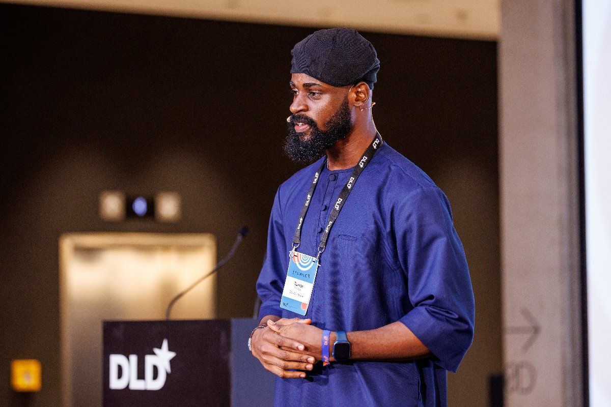 A photo of Tunde Onakoya speaking at the Digital Life Design (DLD) innovation conference in Munich on January 11, 2024.