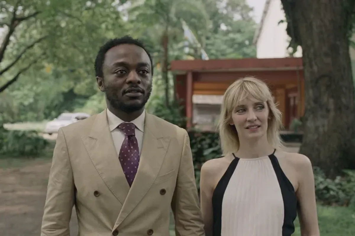A still image of Marc Zinga and Lucy Debay in Baloji’s feature film, ‘Omen.’
