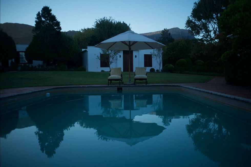 A suburban area in Cape Town shows an outdoor pool. 