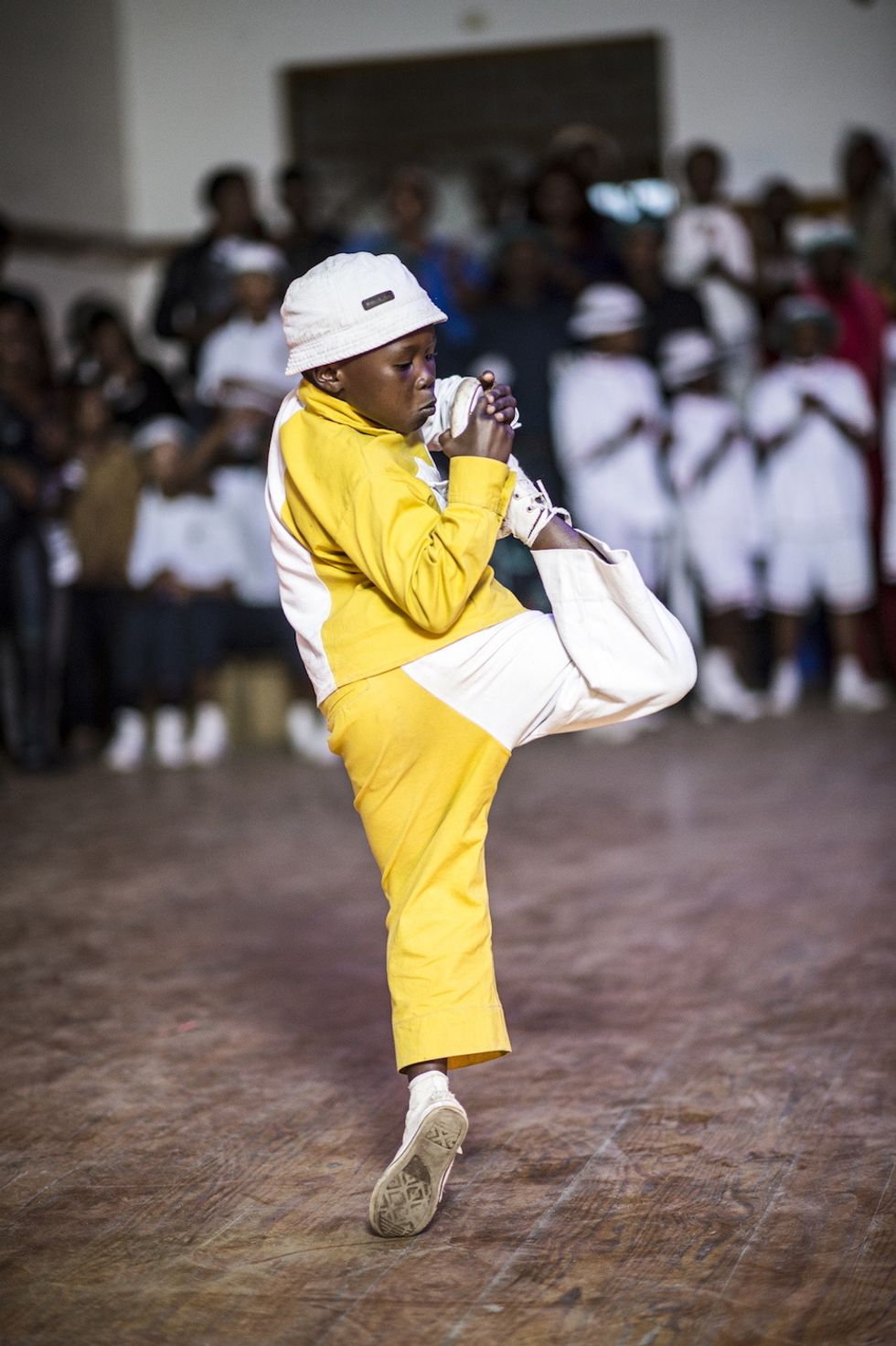 A young pantsula dancer shows off his acrobatic moves. 