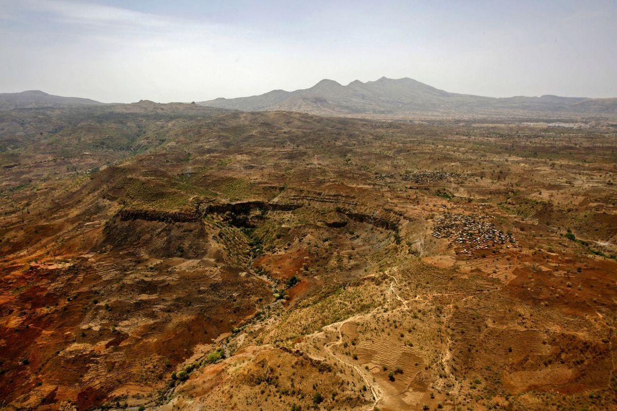 An aerial view of the thickly forested mountainous area of Jebel Marra in central Darfur