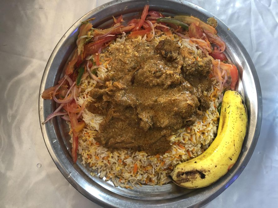 An image of chicken biryani from a food stall in Kibera.