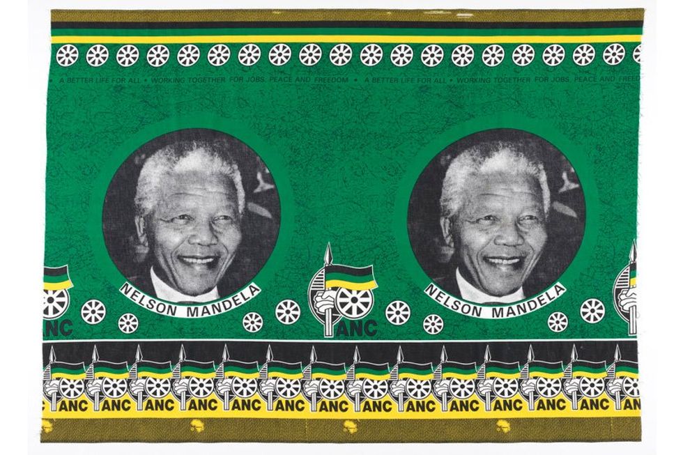 An image of the green and gold cloth with Nelson Mandela\u2019s face on it.