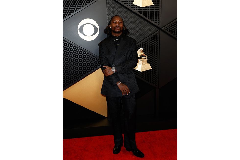 Asake attends the 66th GRAMMY Awards at Crypto.com Arena on February 04, 2024 in Los Angeles, California. (Photo by Frazer Harrison/Getty Images).