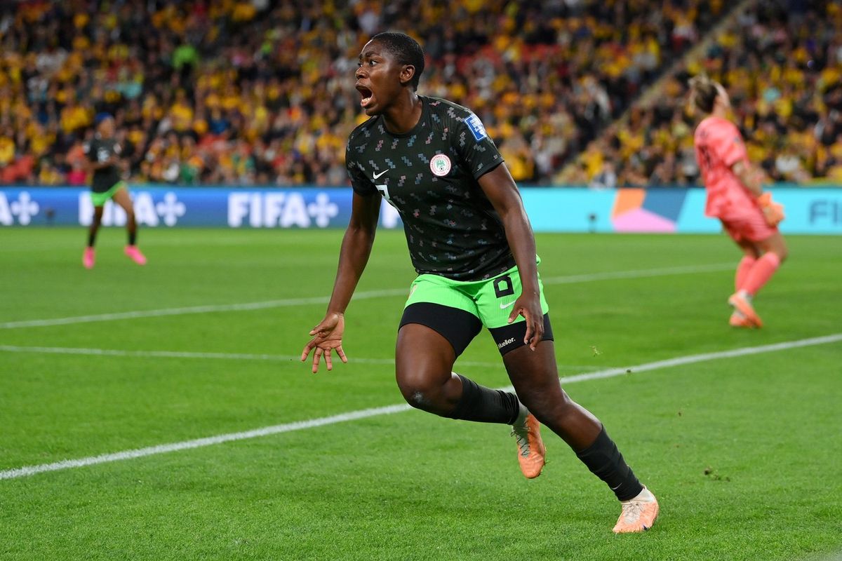 Asisat Oshoala of Nigeria celebrates after scoring her team's third goal during the FIFA Women's World Cup Australia & New Zealand 2023 Group B match between Australia and Nigeria at Brisbane Stadium on July 27, 2023 in Brisbane, Australia.