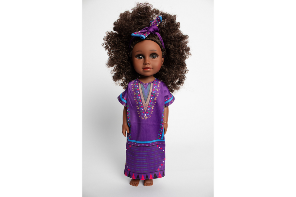 Bell\u2019s Toys newest doll, West-African-inspired Baby Sade wearing a dashiki.