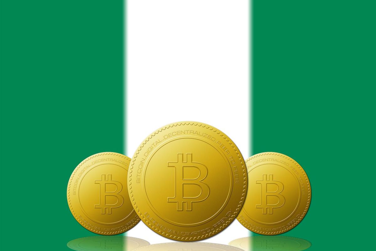 bitcoins in front of nigeria flag