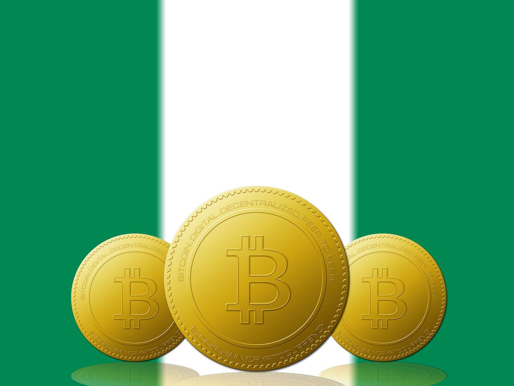 bitcoins in front of nigeria flag