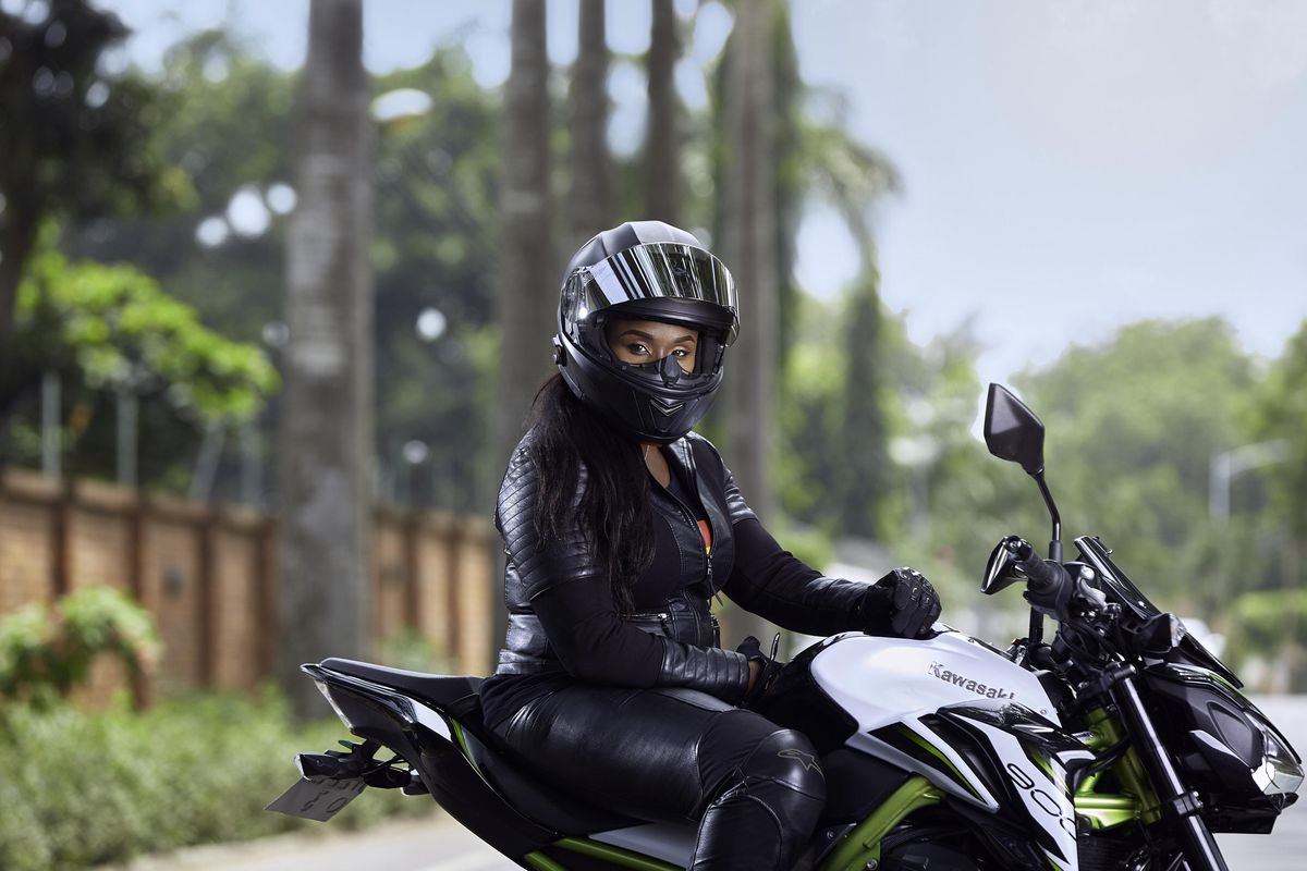 Black woman on motorcycle 