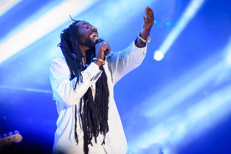 Buju Banton sings on stage.