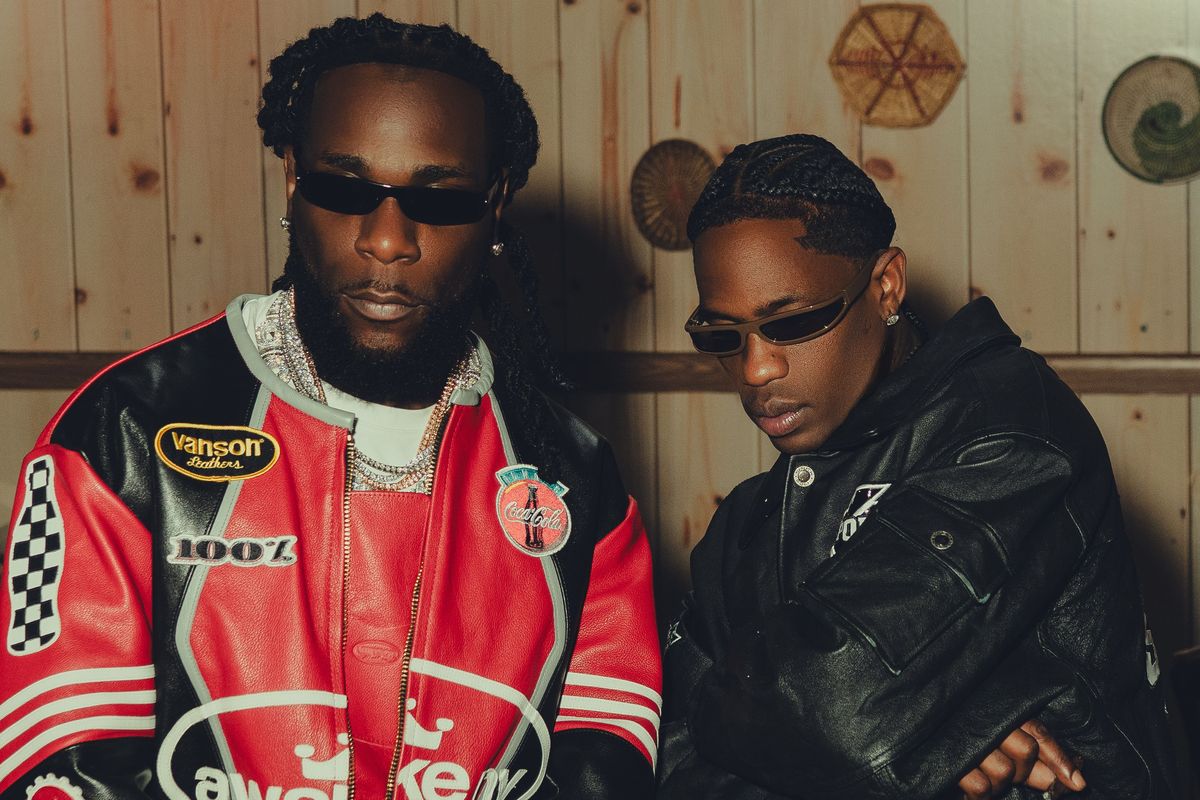 Burna Boy and Travis Scott pose in leather jackets in a new promotional image for their joint single “TaTaTa.”