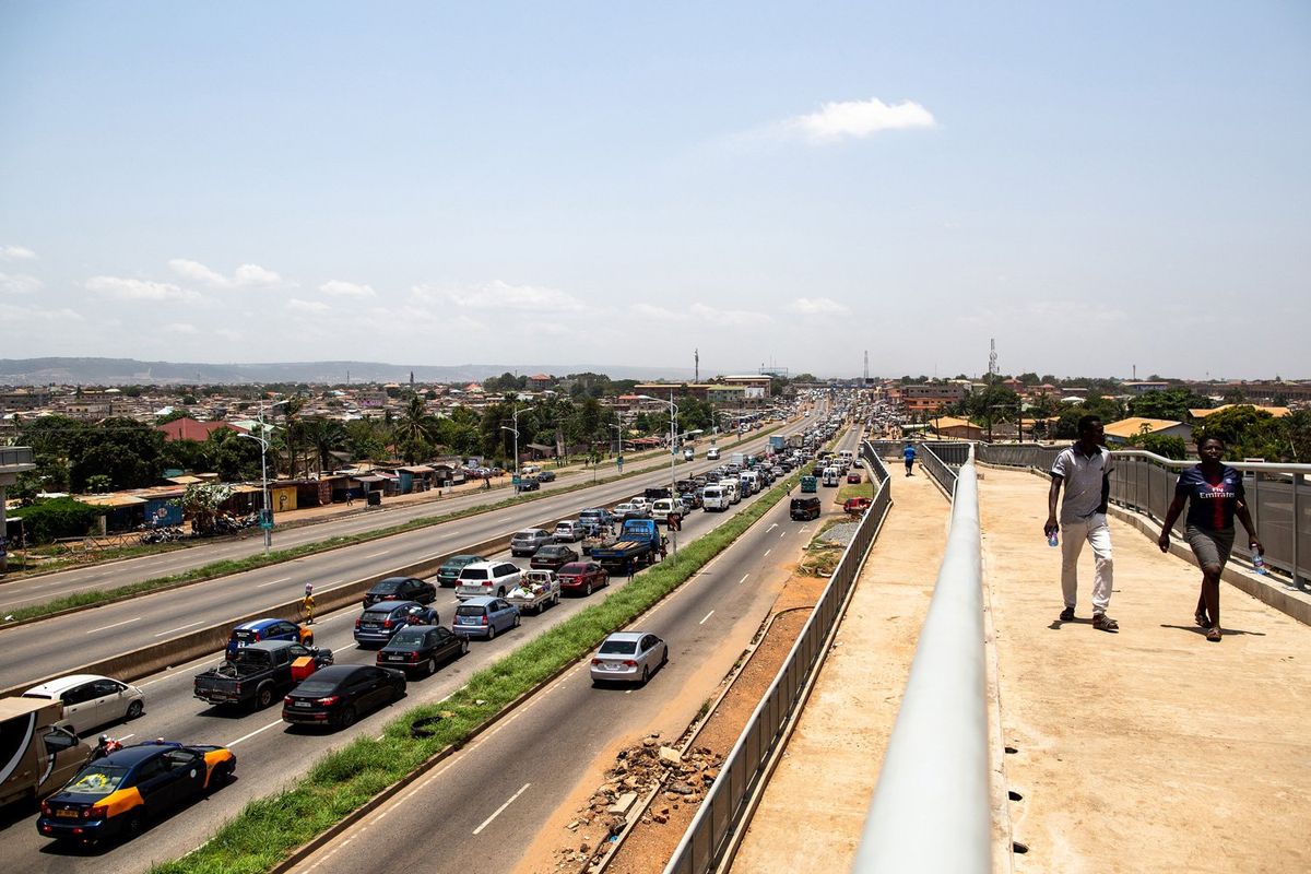 Cars line up in the direction of the Madina Market in Accra after the lockdown announcement on March 28, 2020.