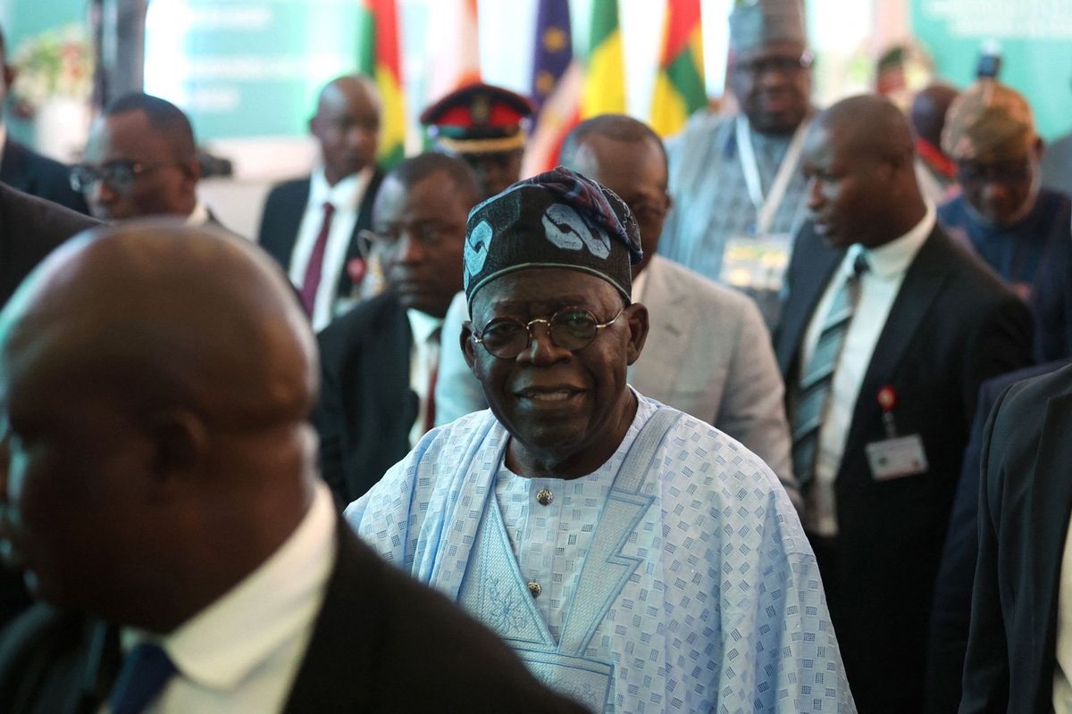 Chairperson of Economic Community of West African States (ECOWAS) and President of Nigeria Bola Ahmed Tinubu reacts after addressing ECOWAS Head of States and Government extraordinary session in Abuja, on August 10, 2023.