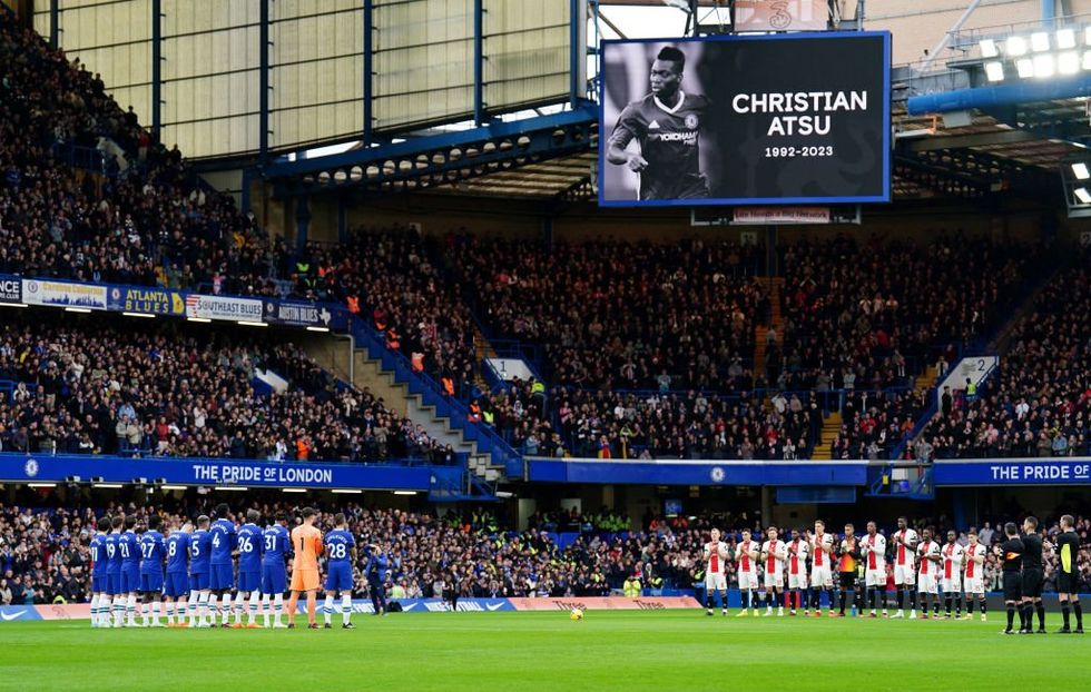 Chelsea and Southhampton players observe a moments applause in memory of Christian Atsu prior to the Premier League match at Stamford Bridge, London on Saturday February 18, 2023.