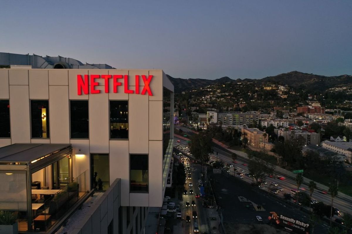 Close up shot of the Netflix logo on top of their office building.