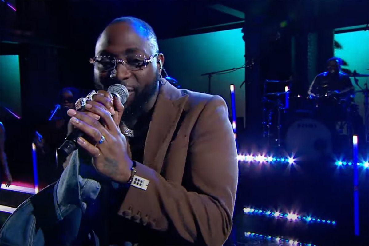 Davido performing with a live band at The Late Show With Stephen Colbert.