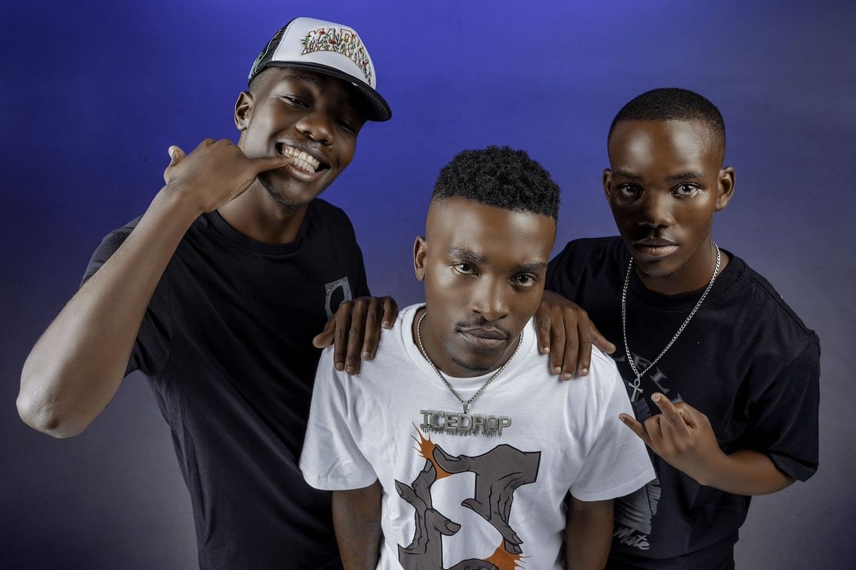 DJ Lag, Mr Nation Thingz and K.C Driller pose in a promotional shoot for their new single.
