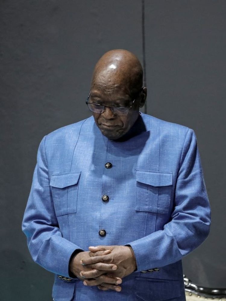 Former South African President Jacob Zuma bows his head while praying during the Shekainah Healing Ministries Prophetic Pillowcase service in Philippi, near Cape Town, on March 10, 2024 ahead of the South African Presidential elections scheduled for May 29, 2024.