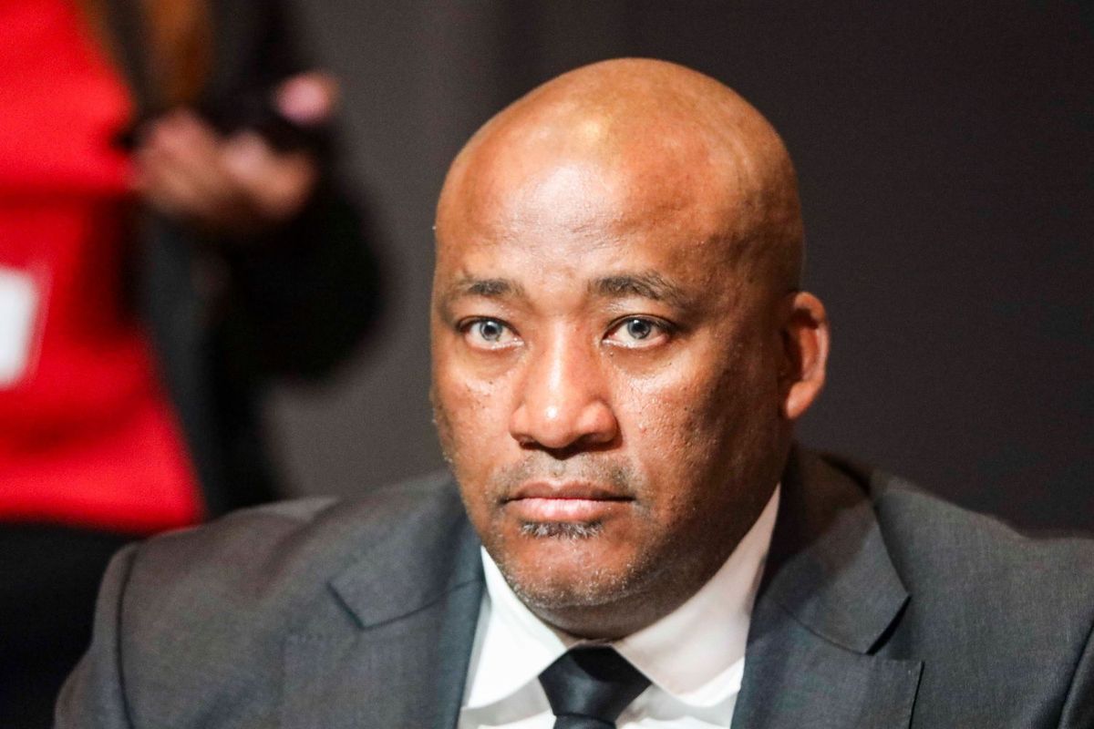 Gayton McKenzie staring ahead, face expressionless
