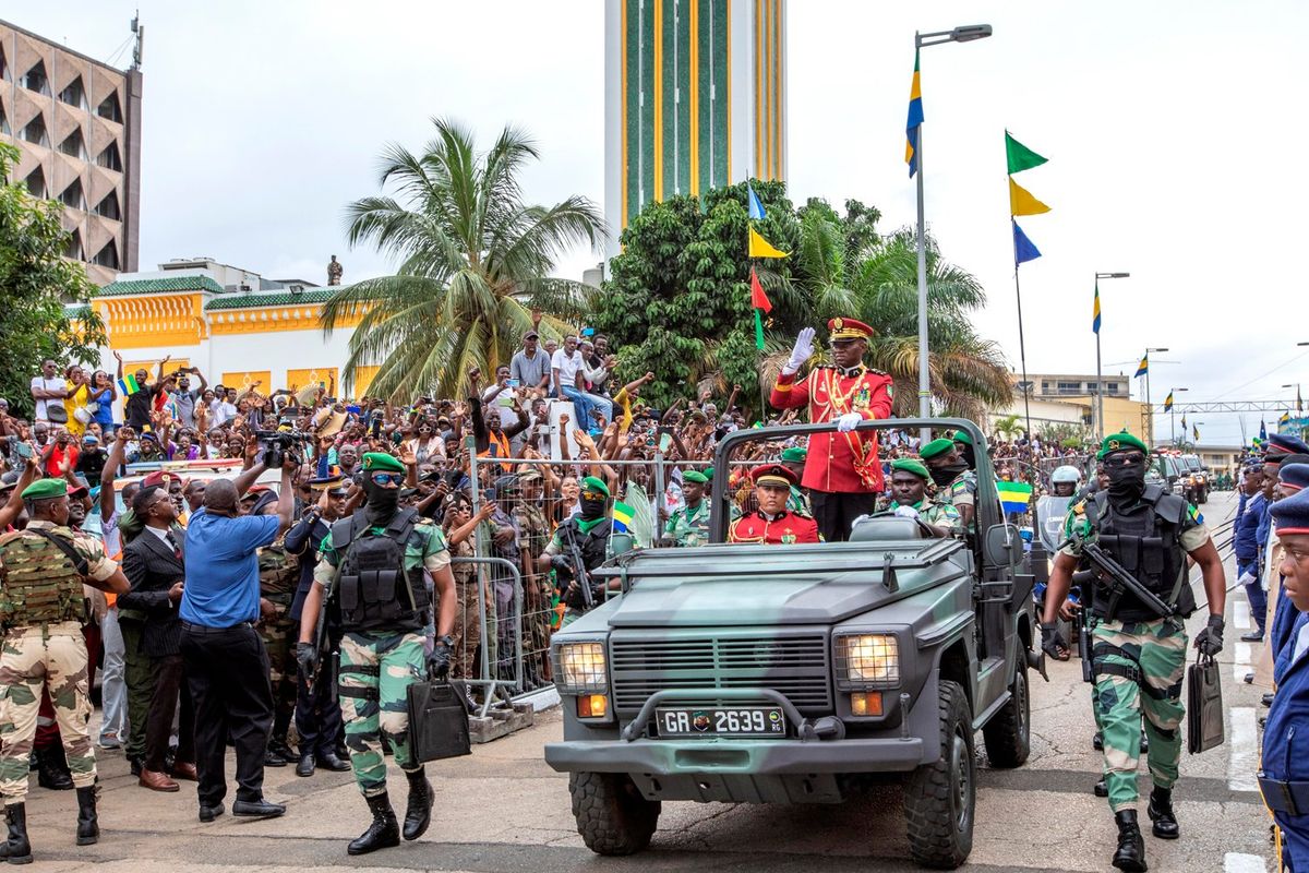 General Brice Clotaire Oligui Nguema greets the people of Gabon who came to cheer him after his inauguration as President of the Transition in Gabon, on 04 August 2023 at the Presidential Palace in Libreville.