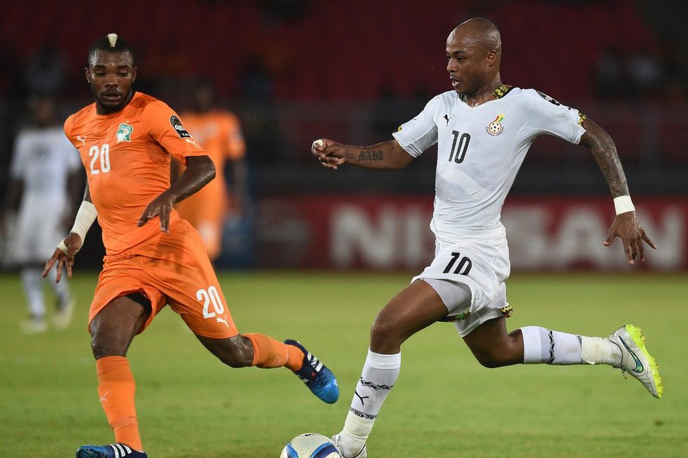 Ghana's midfielder Andre Ayew (R) challenges Ivory Coast's midfielder Serey Die during the 2015 African Cup of Nations final football match between Ivory Coast and Ghana in Bata on February 8, 2015.