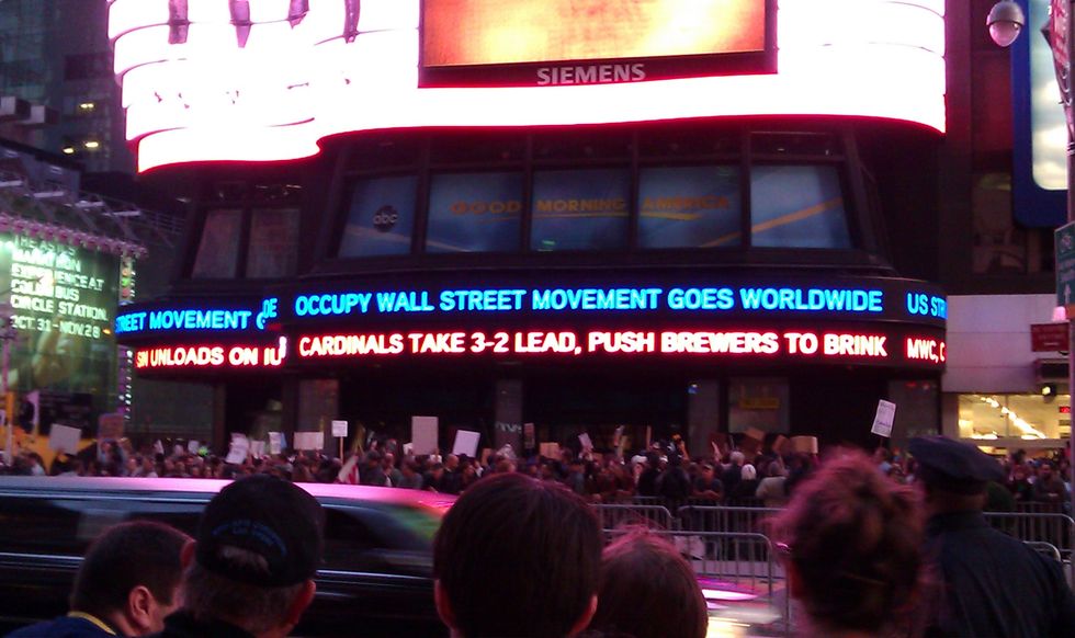 Occupy Wall Street Occupies Time Square and A Madagascar Tradition