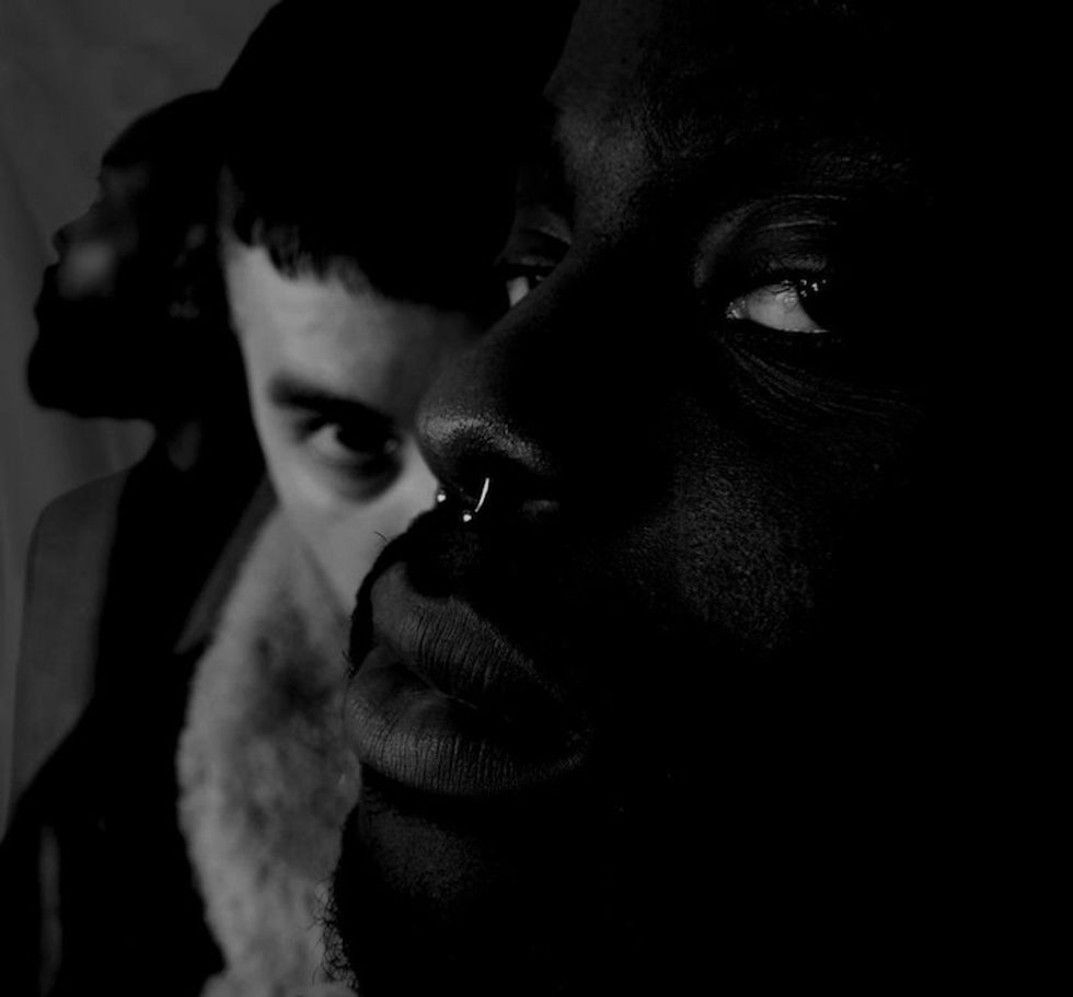 Young Fathers & Massive Attack Share The Creepy 'Voodoo in My Blood' Video, Starring Rosamund Pike