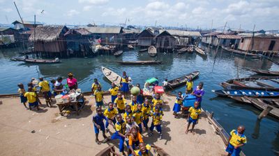 Nigerian children in Lagos floating neighborhood go to school
