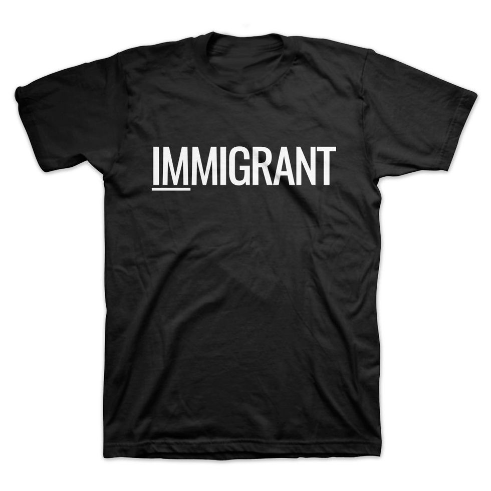 ‘IMMIGRANT’ T-Shirts Now At The OkayAfrica Shop