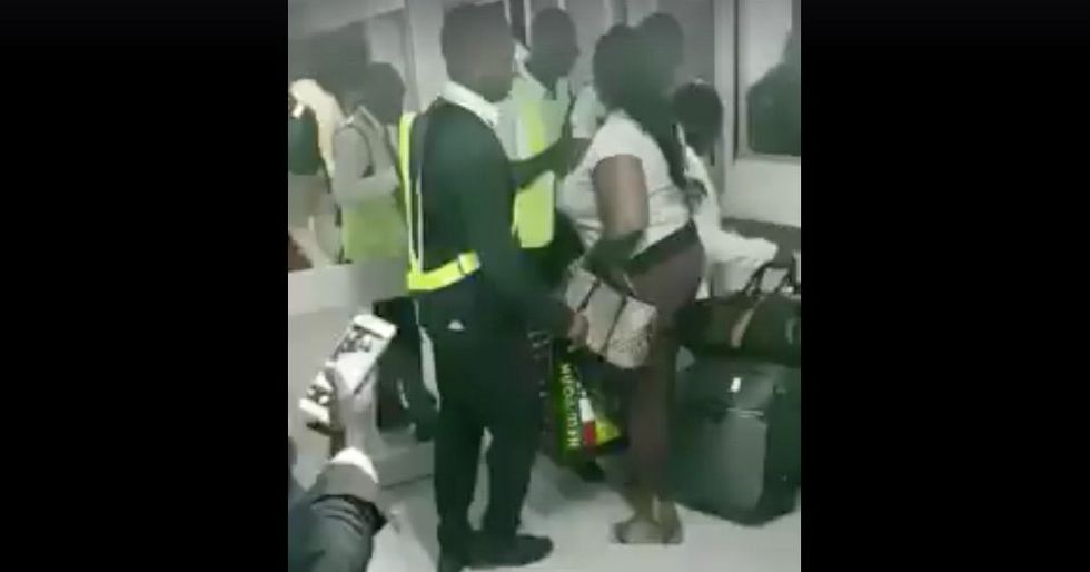 This Video Shows a Woman Being Violently Ejected From a Kenya Airways Flight After Asking About a Delay