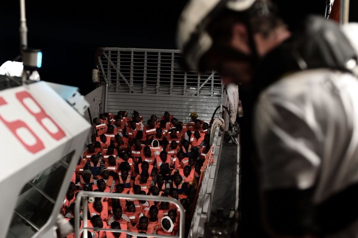 Hundreds of Rescued Migrants Begin Their Journey to Spain After Italy Refused To Take Them In