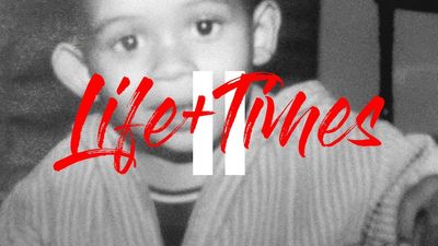The cover of 'Life + Times 2': A monochrome baby photo of The Big Hash with red and white text.