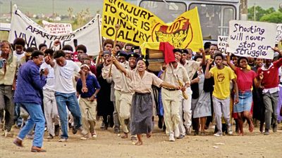 A still from the film, Mapantsula, of people protesting.