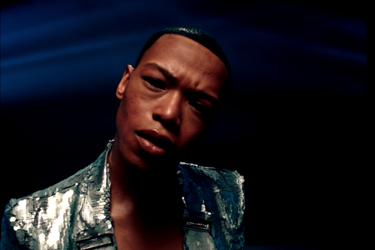 Watch Nakhane Perform in A Shiny Suit in The Music Video For ‘Interloper’