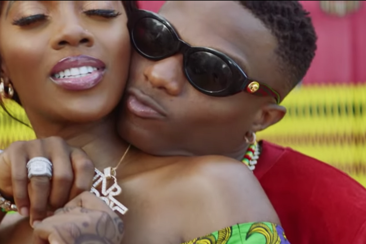 WizKid and Tiwa Savage Get Cozy In The Video For ‘Fever’