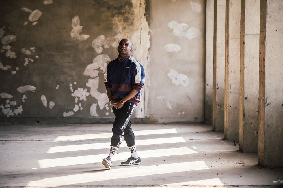 K.O poses in a promotional shoot for his collaboration with Asics for the launch of ASICSTIGER in Africa.