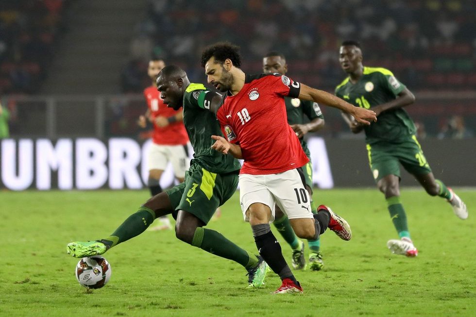 Kalidou Koulibaly of Senegal team battle for the ball with Mohamed Salah  of Egypt team during the 2021 Africa Cup of Nations final soccer match between Senegal and Egypt at the Paul Biya 'Olembe' Stadium, Yaounde, Cameroon 06 February 2022.