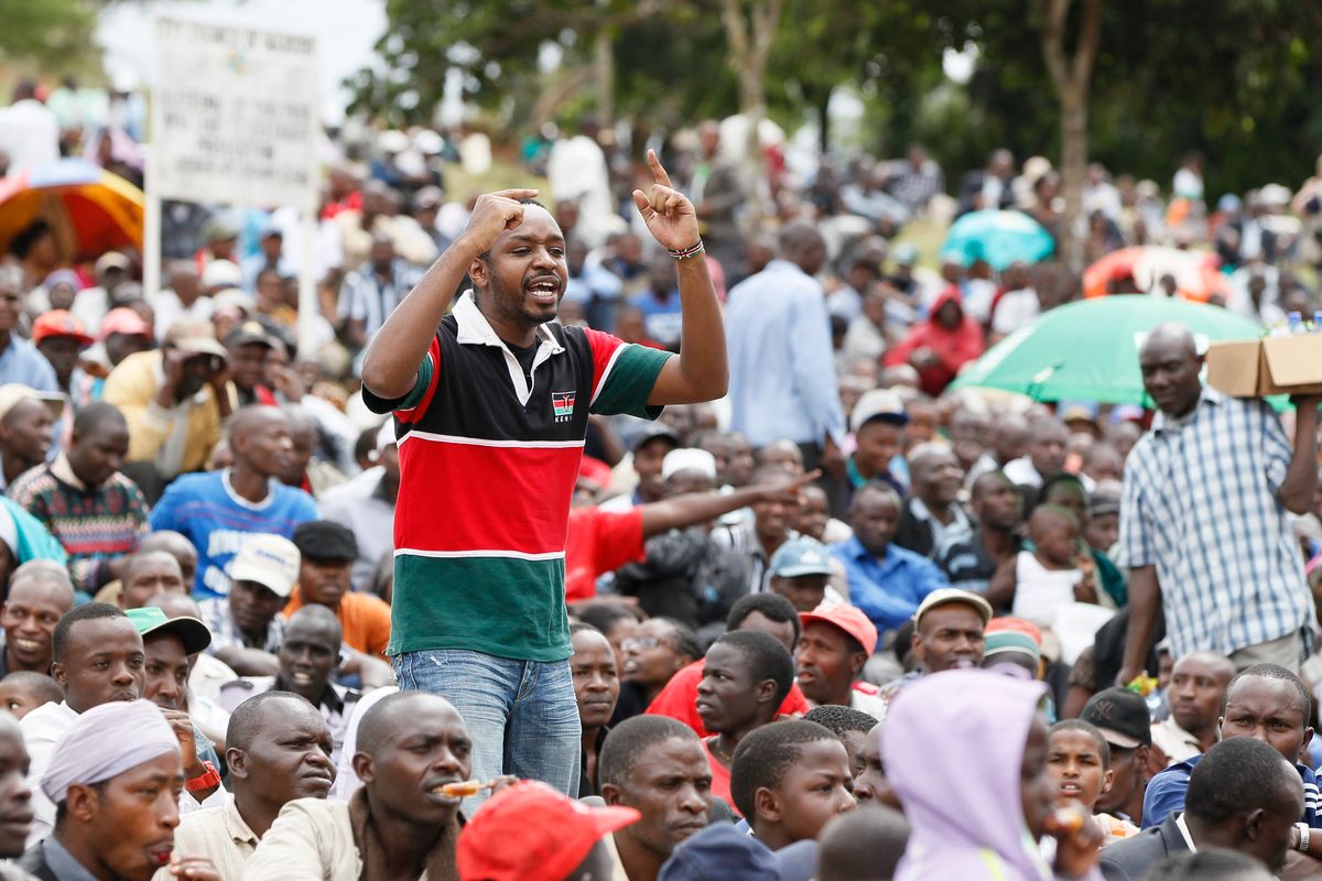 Kenyan anti-corruption protest leader Boniface Mwangi lecturing a crowd in a scene from Softie.