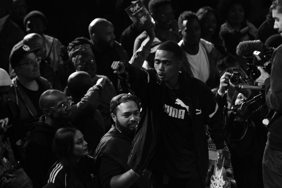 Lee-Shane at a breakdancing competition. He is flanked by an adoring crowd, moments after being crowned as the South African champion for Red Bullu2019s Dance Your Style competition.