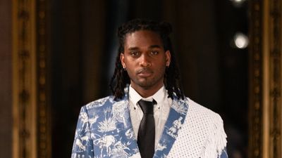A male model wears South African brand Molebatsi during the Spring/Summer 24 show at Milan Fashion Week.