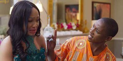Thando Thabethe and Busisiwe Lurayi in a scene from How To Ruin Christmas: The Wedding