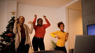 Three black people dancing 