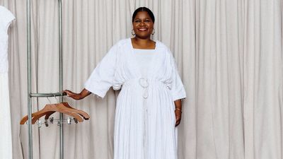 A photo of Angela Brito wearing an outfit made from the Cape Verdean traditional pánu di téra.